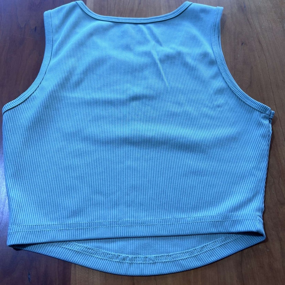 A sage green tank top